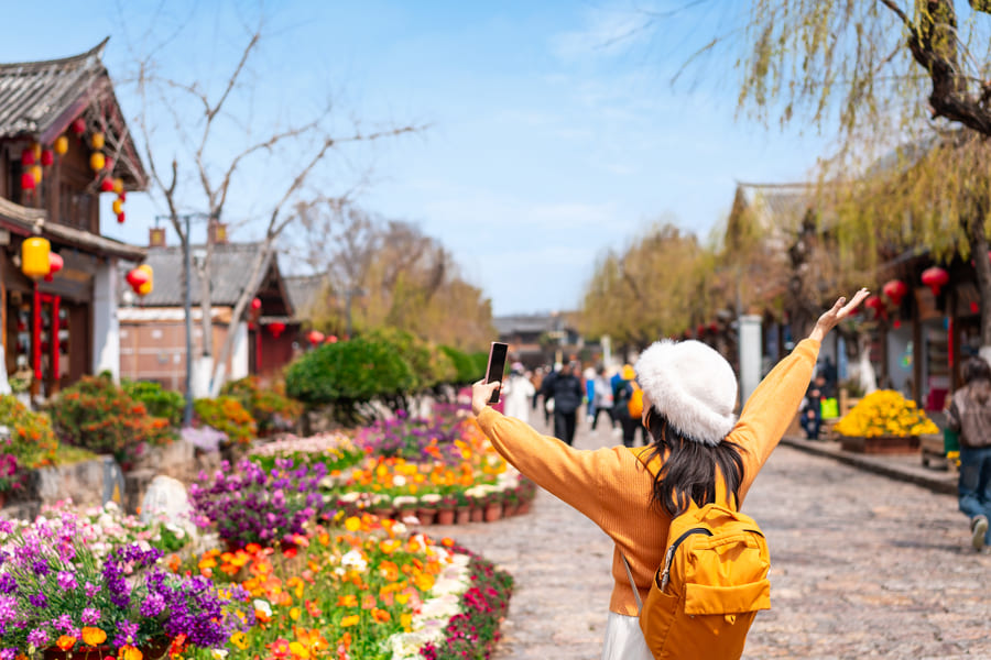 Mujer feliz en Yunnan